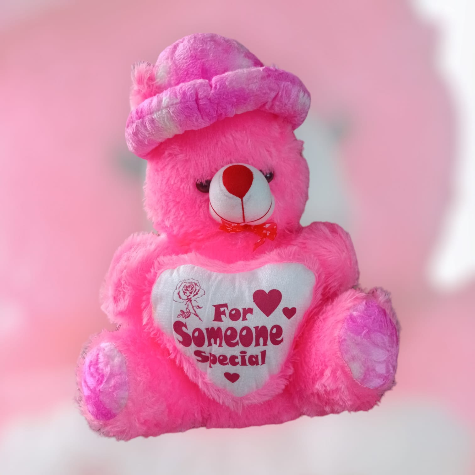 "Adorable 1-Foot Pink Teddy Bear: Perfect Cuddle Companion for Little Ones!"